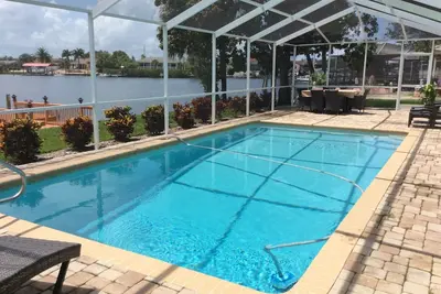 Image de Superbe maison Waterfront 3\/2 avec piscine privée \/ quai \/ ascenseur à bateaux et vues incroyables