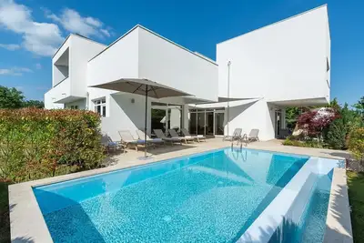 Image de Villa Kate Zminj, belle et moderne, avec sauna, piscine extérieure et piscine intérieure