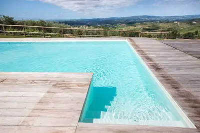 Image de Bel appartement avec piscine, climatisation, Wifi, Tv et vue panoramique, près de San Gimignano