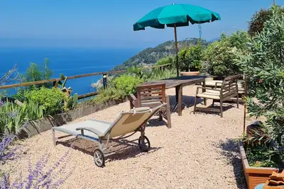 Image de Cà Gialla à Bonassola votre terrasse avec vue sur la mer et les étoiles
