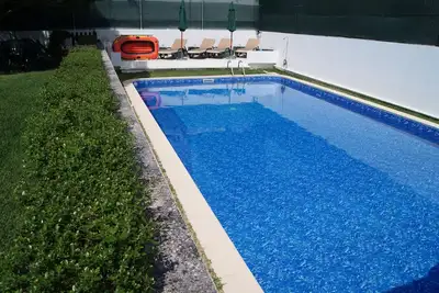 Image de Mignonne Maison, Jardin et Piscine privée, centre plage et ville Figueira Foz