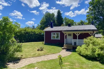 Image de Maison de vacances idyllique près d'Örkelljunga, terrasse ensoleillée, poêle à bois, forêts et lacs