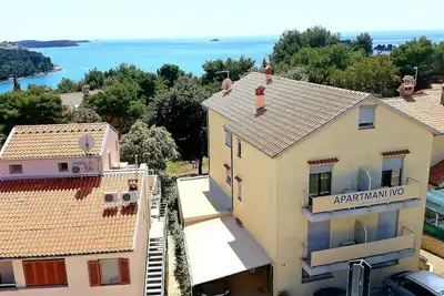 Image de Appartement Ă Rovinj (Borik) endroit calme - 150m de la plage - climatisation - balcon