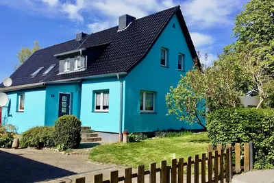 Image de maison de vacances confortable également adaptée à la famille élargie,