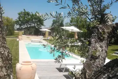 Image de Maison de vacances avec jardin, piscine, bain à remous, fitness et sauna