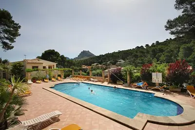 Image de Appartement dans petit Apt. Propriété, grande piscine, près de la plage, Wifi gratuit