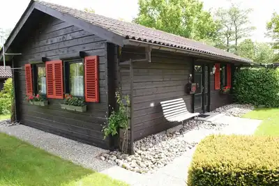 Image de Cabane en rondins avec W-Lan - grande terrasse avec auvent - cabane en rondins avec W-Lan - très proche de la plage