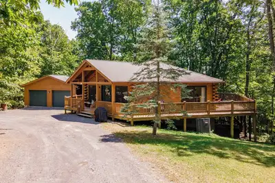Image de Cosy Cabin - Tranquille Cabine 4 chambres dans cadre boisé calme