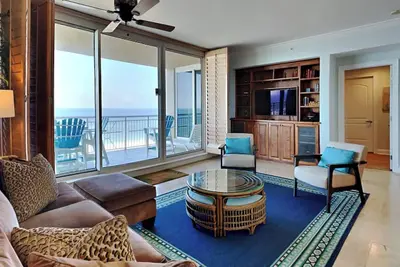 Image de Condo sur la plage mis à jour! Unité de coin spacieuse avec très grand balcon. Des tonnes de commodités