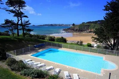 Image de Appartement rustique + confortable | Accès direct à la plage!