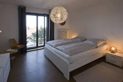 Image de Behindertengerechte Ferienwohnung mit SĂĽdterrasse