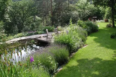 Image de Bel appartement avec jardin, cheminée et étang de baignade - emplacement fantastique