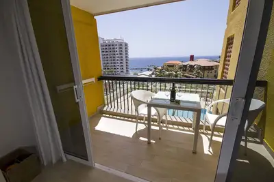 Image de 150 m de la plage de sable, couchers de soleil fantastiques, WiFi, Tv satellite, piscines