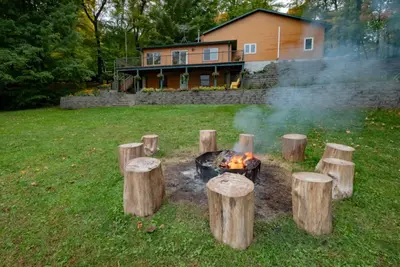 Image de Cabine au Bord du Lac, Grand Jardin Privé, Location de Pontons, Billard, Arcade, Sauna