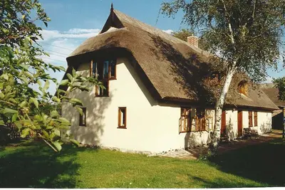 Image de Vacances dans une maison de pêcheur au toit de chaume