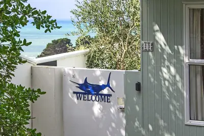Image de Castlepoint - Maison familiale privée sur la plage avec une vue imprenable sur le soleil.
