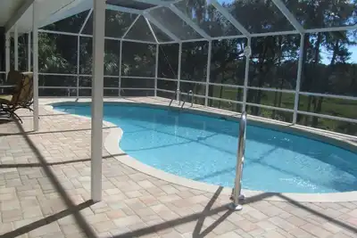Image de Spectaculaire maison au bord de l'eau! ! W \/ piscine, quai, kayaks, canoës, vélos! Rapide au Golfe