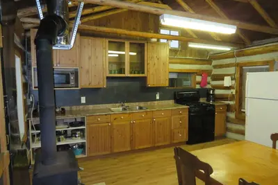 Image de Cabanes rustiques au bord du lac