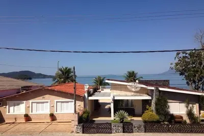 Image de Pé na Areia Beach House