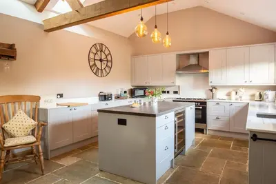 Image de Unique pigeonnier converti / écuries pour 6 personnes situé dans les Cotswolds.