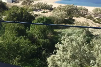 Image de T2 à Troia, de qualité, sur la plage avec vue imprenable et piscine