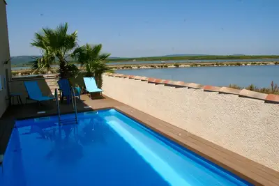 Image de Maison climatisée avec piscine située à 300 m de la plage