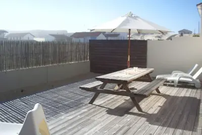 Image de Maison pied dans le sable 200 m plage ocean tout confort
