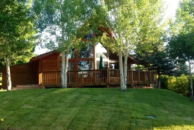 Image de Chalet acceptant les chiens avec accès à une piscine chauffée et à un bain à remous communs