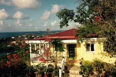 Image de Le 'Cottage' à la Porte du Lion - Vue spectaculaire dans un environnement luxuriant