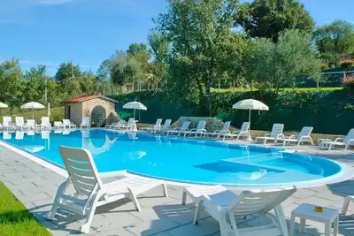 Image de Joli appartement dans une maison de vacances avec piscine, Wifi, climatisation, Tv, patio et parking