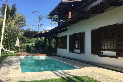 Image de Itamambuca condo 15 personnes 5 suites 11985367259 piscine pied dans le sable