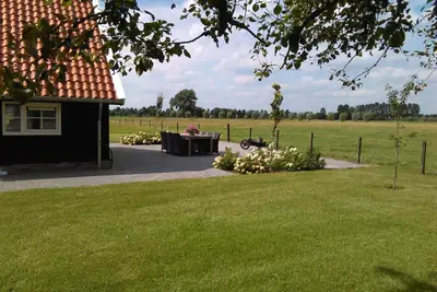 Image de Maison de vacances Het Assenhoekje offre espace et tranquillité, jardin clos et wifi gratuit