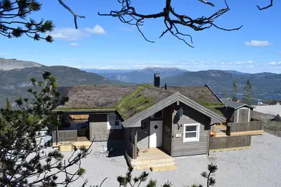 Image de Maison en bois avec vue magnifique sur la montagne et le lac, ski, randonnée, baignade, chiens admis