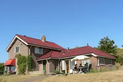Image de Hébergement de vacances au pied des dunes de la plage de Petten.