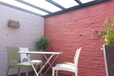 Image de Appartement avec patio, au calme, près du marché et en plein centre ville