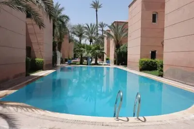 Image de Les Portes de la Médina-Riad dans magnifique résidence sécurisée - piscine -wifi