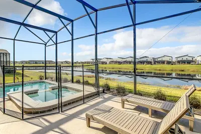 Image de Nouvelle maison de 5 chambres à 10 minutes de Disney World