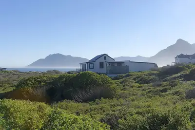 Image de Paradise Beach, sur la plage, avec piscine chauffée, propriété privée sécurisée