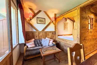 Image de Studio avec lit clos savoyard et coin montagne au pied des pistes