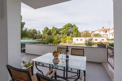 Image de Appartement de vacances avec terrasse et air conditionné