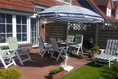 Image de Maison de vacances près de la plage, terrasse ensoleillée, 6 lits, barbecue Weber, vélos, WiFi, Tv