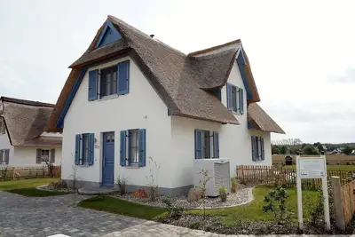 Image de Chaumière avec jardin clôturé - draps et serviettes inclus, sauna, cheminée