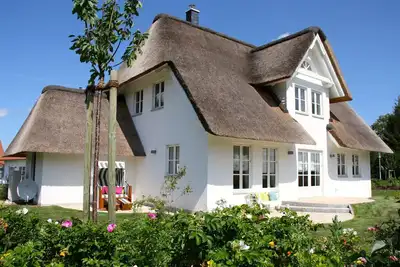 Image de Plage rose, appartement pour se sentir bien au premier étage, Wi-Fi gratuit, chaise de plage