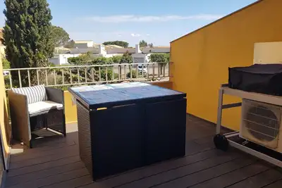 Image de Appartement Avec Terrasse \nWIFI Clim\n Accee A La Plage A 150 M