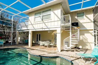 Image de Pointe de l'île! 3br / 2Bath, piscine chauffée, Canal / Dock, à pied des plages et des restaurants