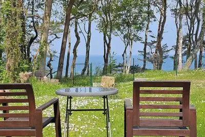 Image de Maison de vacances avec vue mer inoubliable, cheminée, garage, WiFi,