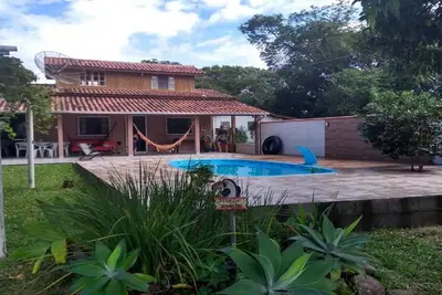Image de Casa do Cantinho - À Imbituba avec piscine à proximité de toutes les plages célèbres