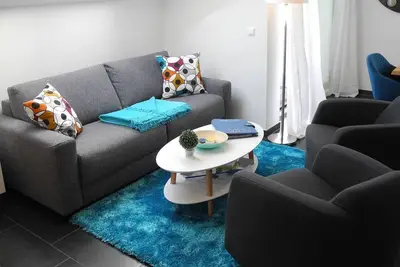 Image de Fantastique appartement mansardé avec sauna, jacuzzi, Wi-Fi et d'un balcon - en bord de mer