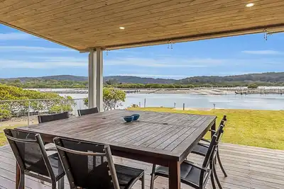 Image de Boat House Starboard - 2 Lindo Street - Face à la rivière Bermagui, parking pour bateaux