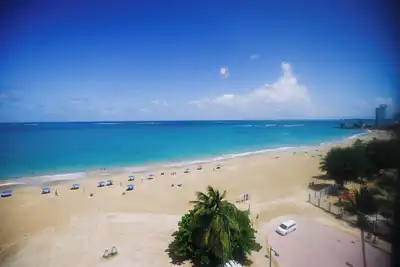 Image de Spectaculaire Beach Front Condo au coeur de Isla Verde! #1